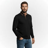 Polo noir manches longues brodé d'un ballon de rugby BACK to LEGEND