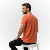 Polo homme orange col rayé et poche poitrine BACK to LEGEND (vue de dos)