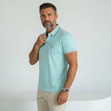 Polo homme turquoise en jersey élasthanne Blacks Legend