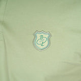 Polo homme vert amande en jersey élasthanne Blacks Legend (zoom sur le logo brodé)
