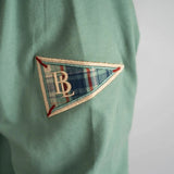 Polo manches longues vert d'eau multi patch Back to Legend (zoom sur la manche)