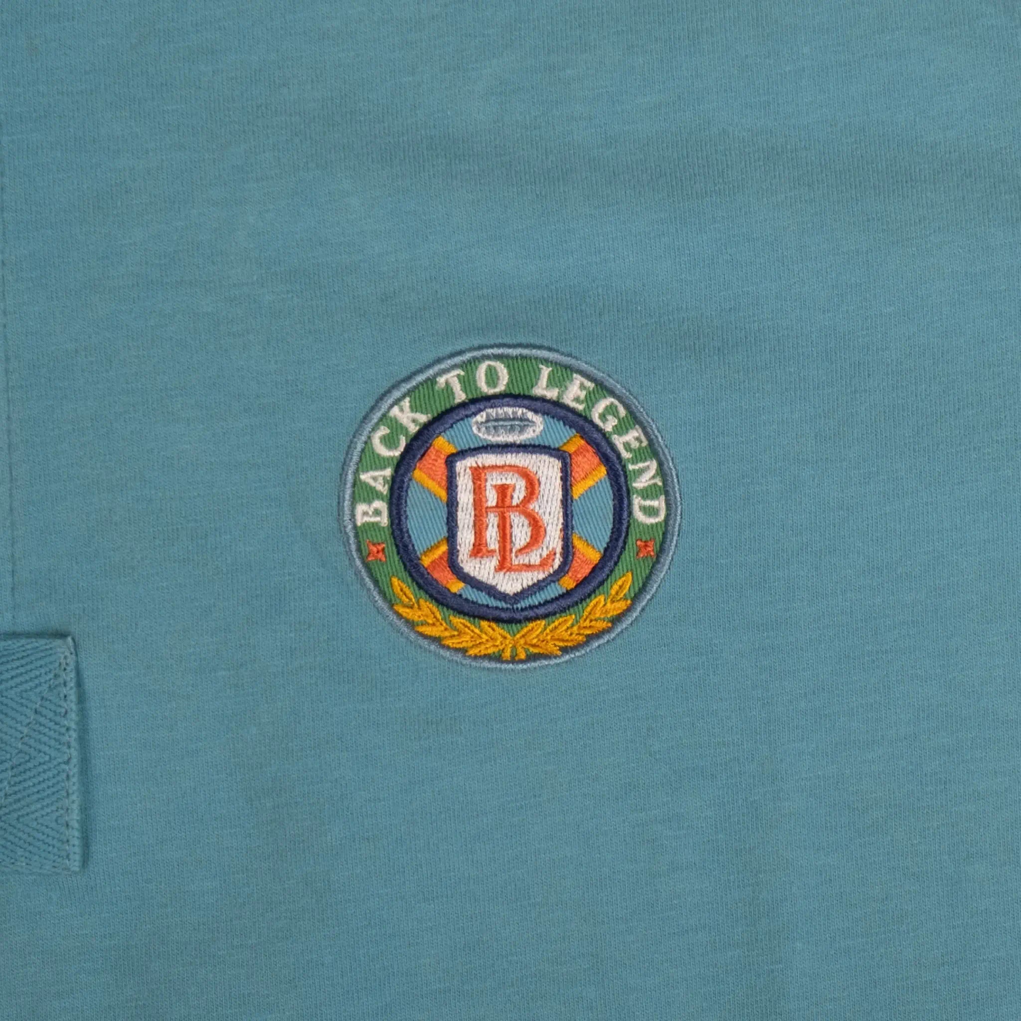 Polo multicolore n°9 toucher peau de pêche BACK TO LEGEND (zoom badge brodé)